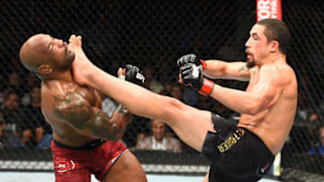 CHICAGO, ILLINOIS - JUNE 09: (R-L) Robert Whittaker of New Zealand lands a front kick to the face of Yoel Romero of Cuba in their middleweight fight during the UFC 225 event at the United Center on June 9, 2018 in Chicago, Illinois. (Photo by Josh Hedges/Zuffa LLC/Zuffa LLC via Getty Images)