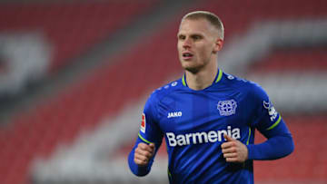 FREIBURG IM BREISGAU, GERMANY - DECEMBER 19: Mitchel Bakker of Bayer 04 Leverkusen reacts during the Bundesliga match between Sport-Club Freiburg and Bayer 04 Leverkusen at Europa-Park-Stadion on December 19, 2021 in Freiburg im Breisgau, Germany. (Photo by Christian Kaspar-Bartke/Getty Images)