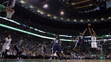 Mar 9, 2016; Boston, MA, USA; Boston Celtics guard Marcus Smart (36) shoots against Memphis Grizzlies forward P.J. Hairston (19) in the second half at TD Garden. The Celtics defeated Memphis 116-96. Mandatory Credit: David Butler II-USA TODAY Sports