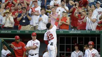 WASHINGTON, DC - MAY 21: Juan Soto #22 of the Washington Nationals acknowledges the crowd after hitting a home run in the second inning for his first career Major League hit against the San Diego Padres at Nationals Park on May 21, 2018 in Washington, DC. (Photo by Greg Fiume/Getty Images)