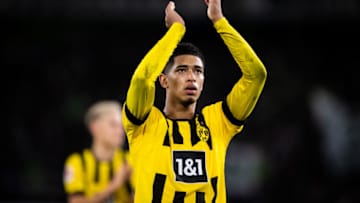 WOLFSBURG, GERMANY - NOVEMBER 08: Jude Bellingham of Dortmund shows appreciation to the fans after the Bundesliga match between VfL Wolfsburg and Borussia Dortmund at Volkswagen Arena on November 08, 2022 in Wolfsburg, Germany. (Photo by Marvin Ibo Guengoer - GES Sportfoto/Getty Images)