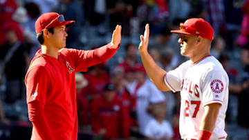 ANAHEIM, CA - APRIL 06: Shohei Ohtani #17 gives Mike Trout #27 of the Los Angeles Angels of Anaheim a high five after defeating the Texas Rangers at Angel Stadium of Anaheim on April 6, 2019 in Anaheim, California. (Photo by Jayne Kamin-Oncea/Getty Images)