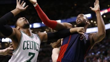 Mar 9, 2014; Boston, MA, USA; Boston Celtics center Jared Sullinger (7) blocks out against Detroit Pistons power forward Greg Monroe (10) during the first half at TD Garden. Mandatory Credit: Mark L. Baer-USA TODAY Sports