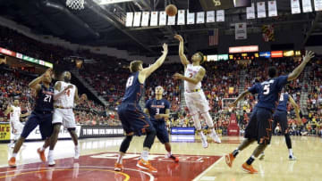 Mar 3, 2016; College Park, MD, USA; Maryland Terrapins guard Melo Trimble (2) shoots over Illinois Fighting Illini forward Michael Finke (43) during the second half at Xfinity Center. Maryland Terrapins defeated Illinois Fighting Illini 81-55. Mandatory Credit: Tommy Gilligan-USA TODAY Sports