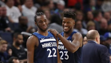 MINNEAPOLIS, MN - NOVEMBER 5: Andrew Wiggins #22 and Jimmy Butler #23 of the Minnesota Timberwolves celebrates a win against the Charlotte Hornets on November 5, 2017 at Target Center in Minneapolis, Minnesota. NOTE TO USER: User expressly acknowledges and agrees that, by downloading and or using this Photograph, user is consenting to the terms and conditions of the Getty Images License Agreement. Mandatory Copyright Notice: Copyright 2017 NBAE (Photo by Jordan Johnson/NBAE via Getty Images)