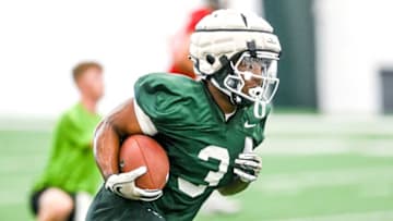 Michigan State running back Jarek Broussard runs the ball during practice on Thursday, Aug. 4, 2022, in East Lansing.220804 Msu Fb Practice 067a
