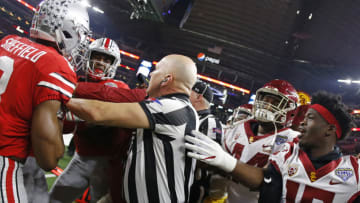 ARLINGTON, TX - DECEMBER 29: Players from both teams participate in a skirmish in the second half of the 82nd Goodyear Cotton Bowl Classic between USC and Ohio State at AT&T Stadium on December 29, 2017 in Arlington, Texas. Ohio State won 24-7. (Photo by Ron Jenkins/Getty Images)