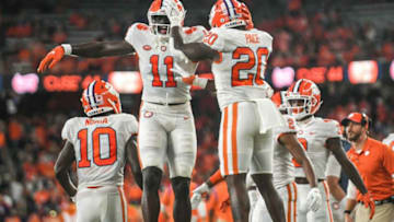 Clemson wide receiver Ajou Ajou (11) celebrates after running back Kobe Pace (20) scored from one yard out during the second quarter at the Carrier Dome in Syracuse, New York, Friday, October 15, 2021.Ncaa Football Clemson At Syracuse