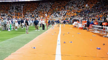 The Ole Miss bench is cleared while the game is paused because objects were being thrown onto the field during a football game between Tennessee and Ole Miss at Neyland Stadium in Knoxville, Tenn. on Saturday, Oct. 16, 2021.Kns Tennessee Ole Miss Football Bp