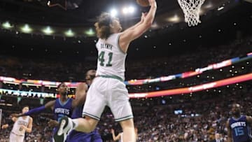 Apr 11, 2016; Boston, MA, USA; Boston Celtics center Kelly Olynyk (41) drives to the basket past Charlotte Hornets center Al Jefferson (25) during the second half at TD Garden. Mandatory Credit: Bob DeChiara-USA TODAY Sports