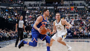 INDIANAPOLIS, IN - DECEMBER 04: Doug McDermott #20 of the New York Knicks drives against Bojan Bogdanovic #44 of the Indiana Pacers during a game at Bankers Life Fieldhouse on December 4, 2017 in Indianapolis, Indiana. The Pacers won 115-97. (Photo by Joe Robbins/Getty Images)