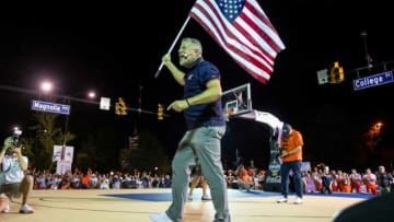 Auburn basketball coach Bruce Pearl pumps up the crowd during Tipoff at Toomer's in downtown Auburn, Ala., on Thursday, Oct. 7, 2021.