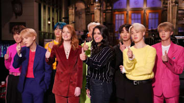 SATURDAY NIGHT LIVE -- "Emma Stone" Episode 1764 -- Pictured: (l-r) Musical guest BTS, host Emma Stone, and Cecily Strong during Promos in Studio 8H on Thursday, April 11, 2019 -- (Photo by: Rosalind O'Connor/NBC)