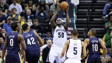 Jan 20, 2014; Memphis, TN, USA; Memphis Grizzlies forward Zach Randolph (50) attempts a shot as New Orleans Pelicans center Alexis Ajinca (42), forward Al-Farouq Aminu (0) and guard Eric Gordon (10) look on at FedExForum. New Orleans defeated Memphis 95-92. Mandatory Credit: Nelson Chenault-USA TODAY Sports