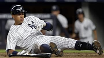 Jul 18, 2016; Bronx, NY, USA; New York Yankees designated hitter Alex Rodriguez (13) is slow to get up after an inside pitch against the Baltimore Orioles during the sixth inning at Yankee Stadium. Mandatory Credit: Adam Hunger-USA TODAY Sports
