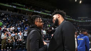 MINNEAPOLIS, MN - JANUARY 2: D'Angelo Russell #0 of the Golden State Warriors and Karl-Anthony Towns #32 of the Minnesota Timberwolves greet each other after a game on January 2, 2020 at Target Center in Minneapolis, Minnesota. NOTE TO USER: User expressly acknowledges and agrees that, by downloading and or using this Photograph, user is consenting to the terms and conditions of the Getty Images License Agreement. Mandatory Copyright Notice: Copyright 2020 NBAE (Photo by David Sherman/NBAE via Getty Images)