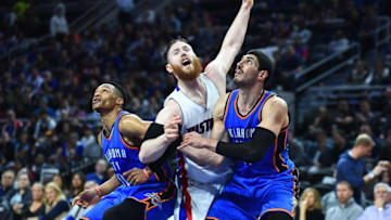 Mar 29, 2016; Auburn Hills, MI, USA; Oklahoma City Thunder center Enes Kanter (11) and guard Russell Westbrook (0) box out Detroit Pistons center Aron Baynes (12) during the fourth quarter at The Palace of Auburn Hills. Mandatory Credit: Tim Fuller-USA TODAY Sports