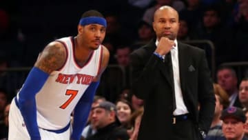 Dec 14, 2014; New York, NY, USA; New York Knicks forward Carmelo Anthony (7) and head coach Derek Fisher during overtime against the Toronto Raptors at Madison Square Garden. Toronto Raptors won 95-90 in overtime. Mandatory Credit: Anthony Gruppuso-USA TODAY Sports
