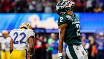 Michigan State defensive end Drew Jordan (2) celebrates a play against Pittsburgh during the first half of the Peach Bowl at the Mercedes-Benz Stadium in Atlanta, Ga. on Thursday, Dec. 30, 2021.