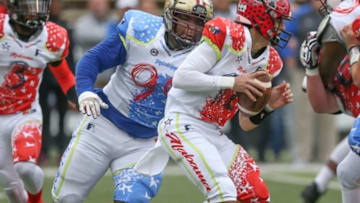 Mississippi's McKinnley Jackson (99) chases Alabama's Logan Smothers (12). The Mississippi-Alabama All-Star Football Game was held on Saturday, December 14, 2019 at M.M. Roberts Stadium at the University of Southern Mississippi. Photo by Keith WarrenMs Al All Star Football Game