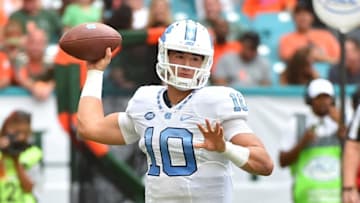 Oct 15, 2016; Miami Gardens, FL, USA; North Carolina Tar Heels quarterback Mitch Trubisky (10) attempts a pass against the Miami Hurricanes during the first half at Hard Rock Stadium. Mandatory Credit: Jasen Vinlove-USA TODAY Sports