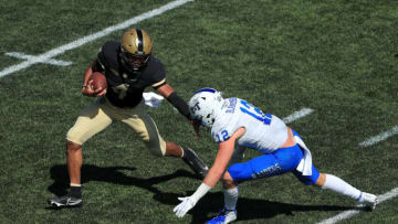 WEST POINT, NEW YORK - SEPTEMBER 05: Christian Anderson #4 of the Army Black Knights runs with the ball against Reed Blankenship #12 of the Middle Tennessee Blue Raiders in the first half at Michie Stadium on September 5, 2020 in West Point, New York. (Photo by Mike Lawrie/Getty Images)