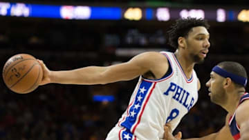 Feb 26, 2016; Philadelphia, PA, USA; Philadelphia 76ers center Jahlil Okafor (8) holds the ball away from Washington Wizards forward Jared Dudley (1) during the second quarter at Wells Fargo Center. Mandatory Credit: Bill Streicher-USA TODAY Sports