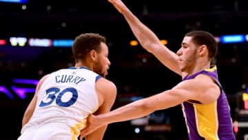 LOS ANGELES, CA - NOVEMBER 29: Lonzo Ball #2 of the Los Angeles Lakers foul Stephen Curry #30 of the Golden State Warriors during the first half at Staples Center on November 29, 2017 in Los Angeles, California. (Photo by Harry How/Getty Images)
