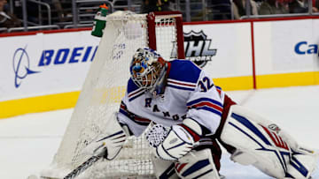 WASHINGTON, DC - JANUARY 17: Goalie Antti Raanta #32 of the New York Rangers covers the puck in the second period against the Washington Capitals at Verizon Center on January 17, 2016 in Washington, DC. (Photo by Rob Carr/Getty Images)