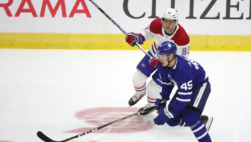 TORONTO, ON- SEPTEMBER 25 - Toronto Maple Leafs center Miro Aaltonen (45) skates by Montreal Canadiens defenseman Brandon Davidson (88) as the Toronto Maple Leafs play the Montreal Canadiens in NHL pre-season action at the Ricoh Coliseum in Toronto. September 25, 2017. (Steve Russell/Toronto Star via Getty Images)