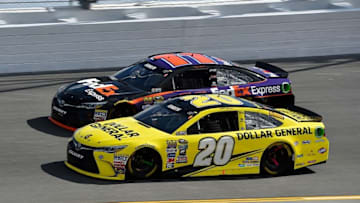 Feb 21, 2016; Daytona Beach, FL, USA; NASCAR Sprint Cup Series driver Matt Kenseth (20) and Denny Hamlin (11) race during the Daytona 500 at Daytona International Speedway. Mandatory Credit: Jasen Vinlove-USA TODAY Sports