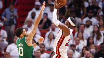 Jimmy Butler #22 of the Miami Heat shoots over Jayson Tatum #0 of the Boston Celtics in Game One of the 2022 NBA Playoffs Eastern Conference Finals(Photo by Michael Reaves/Getty Images)