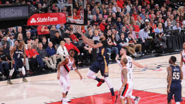 PORTLAND, OR - APRIL 14: Anthony Davis #23 of the New Orleans Pelicans drives to the basket during the game against the Portland Trail Blazers in Game One of the Western Conference Quarterfinals during the 2018 NBA Playoffs on April 14, 2018 at the Moda Center Arena in Portland, Oregon. NOTE TO USER: User expressly acknowledges and agrees that, by downloading and or using this photograph, user is consenting to the terms and conditions of the Getty Images License Agreement. Mandatory Copyright Notice: Copyright 2018 NBAE (Photo by Sam Forencich/NBAE via Getty Images)