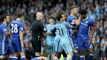 Match referee Anthony Taylor looks on as Chelsea's Gary Cahill (second right) and Manchester City's David Silva (third right) hold back Chelsea's Nathaniel Chalobah (right) and Manchester City's Sergio Aguero (centre) fouls Chelsea's David Luiz (bottom)during the Premier League match at the Etihad Stadium, Manchester. (Photo by Martin Rickett/PA Images via Getty Images)