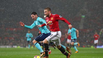 MANCHESTER, ENGLAND - DECEMBER 13: Adam Smith of AFC Bournemouth and Luke Shaw of Manchester United during the Premier League match between Manchester United and AFC Bournemouth at Old Trafford on December 13, 2017 in Manchester, England. (Photo by Catherine Ivill/Getty Images)