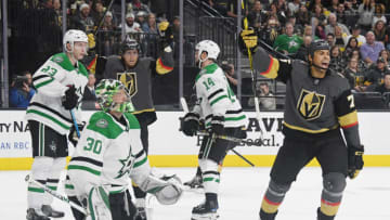 LAS VEGAS, NEVADA - DECEMBER 09: Ben Bishop #30 of the Dallas Stars and Ryan Reaves #75 of the Vegas Golden Knights react after a second-period goal by William Karlsson (not pictured) #71 of the Golden Knights during their game at T-Mobile Arena on December 9, 2018 in Las Vegas, Nevada. (Photo by Ethan Miller/Getty Images)