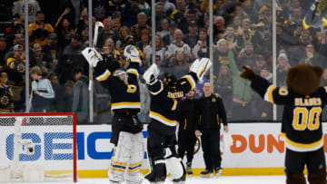 BOSTON, MA - MARCH 4: Linus Ullmark #35 of the Boston Bruins celebrates a victory against the New York Rangers with teammate Jeremy Swayman #1 at the TD Garden on March 4, 2023 in Boston, Massachusetts. The Bruins won 4-2. (Photo by Richard T Gagnon/Getty Images)