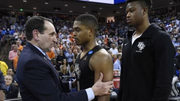 COLUMBIA, SC - MARCH 24: Head coach Mike Krzyzewski of the Duke Blue Devils talks to B.J. Taylor #1 of the UCF Knights after the second round of the 2019 NCAA Men's Basketball Tournament held at Colonial Life Arena on March 24, 2019 in Columbia, South Carolina. (Photo by Grant Halverson/NCAA Photos via Getty Images)