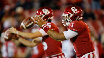 NORMAN, OK - NOVEMBER 23: Quarterback Jalen Hurts #1 of the Oklahoma Sooners takes a snap alongside quarterback Tanner Mordecai #15 before their game against the TCU Horned Frogs on November 23, 2019 at Gaylord Family Oklahoma Memorial Stadium in Norman, Oklahoma. OU held on to win 28-24. (Photo by Brian Bahr/Getty Images)