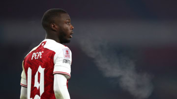 LONDON, ENGLAND - JANUARY 09: Nicolas Pepe of Arsenal looks on during the FA Cup Third Round match between Arsenal and Newcastle United at Emirates Stadium on January 09, 2021 in London, England. The match will be played without fans, behind closed doors as a Covid-19 precaution. (Photo by Julian Finney/Getty Images)