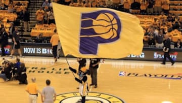 May 18, 2013; Indianapolis, IN, USA; Indiana Pacers mascot Boomer waves a flag during introductions before game six of the second round of the 2013 NBA Playoffs against the New York Knicks at Bankers Life Fieldhouse. The Pacers won 106-99. Mandatory Credit: Pat Lovell-USA TODAY Sports