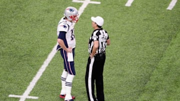 MINNEAPOLIS, MN - FEBRUARY 04: Tom Brady #12 of the New England Patriots talks to referee Gene Steratore #114 prior to the game against the Philadelphia Eagles in Super Bowl LII at U.S. Bank Stadium on February 4, 2018 in Minneapolis, Minnesota. (Photo by Christian Petersen/Getty Images)