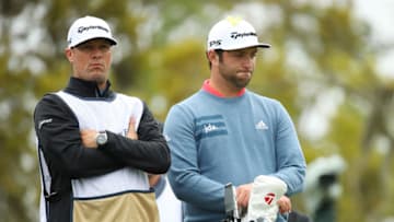 PONTE VEDRA BEACH, FLORIDA - MARCH 17: Jon Rahm of Spain and his caddie look on from the 12th tee during the final round of The PLAYERS Championship on The Stadium Course at TPC Sawgrass on March 17, 2019 in Ponte Vedra Beach, Florida. (Photo by Gregory Shamus/Getty Images)