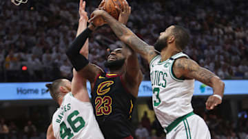 CLEVELAND, OH - MAY 25: Boston Celtics Aron Baynes (46) and Marcus Morris (13) combine to slow down the Cavaliers LeBron James on a first quarter drive to the basket. The Boston Celtics visited the Cleveland Cavaliers for Game Six of their NBA Eastern Conference Finals playoff series at the Quicken Loans Arena in Cleveland, OH on May 25, 2018. (Photo by Jim Davis/The Boston Globe via Getty Images)