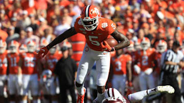 CLEMSON, SOUTH CAROLINA - SEPTEMBER 07: Demani Richardson #26 of the Texas A&M Aggies tries to stop Tee Higgins #5 of the Clemson Tigers during their game at Memorial Stadium on September 07, 2019 in Clemson, South Carolina. (Photo by Streeter Lecka/Getty Images)