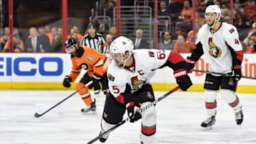 Apr 2, 2016; Philadelphia, PA, USA; Ottawa Senators defenseman Erik Karlsson (65) skates with the puck during the second period against the Philadelphia Flyers at Wells Fargo Center. The Flyers won 3-2. Mandatory Credit: Derik Hamilton-USA TODAY Sports