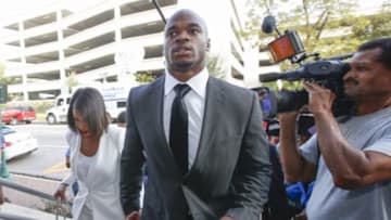 Oct 8, 2014; Conroe, TX, USA; Minnesota Vikings running back Adrian Peterson enters the Montgomery county courthouse for his arraignment. Mandatory Credit: Kevin Jairaj-USA TODAY Sports