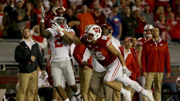 MADISON, WI - OCTOBER 15: Dontre Wilson #2 of the Ohio State Buckeyes makes a catch past Zack Baun #56 of the Wisconsin Badgers in overtime at Camp Randall Stadium on October 15, 2016 in Madison, Wisconsin. (Photo by Dylan Buell/Getty Images)