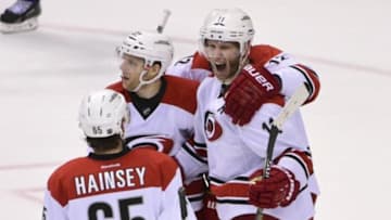 Jan 6, 2016; Vancouver, British Columbia, CAN; Carolina Hurricanes forward Jordan Staal (11) celebrates his goal against Vancouver Canucks goaltender Jacob Markstrom (not pictured) during the third period at Rogers Arena. The Vancouver Canucks won 3-2. Mandatory Credit: Anne-Marie Sorvin-USA TODAY Sports