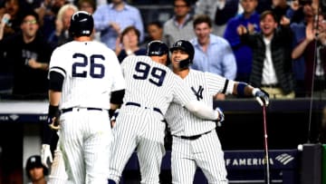 NEW YORK, NEW YORK - SEPTEMBER 18: Aaron Judge #99 of the New York Yankees hugs Gleyber Torres #25 of the New York Yankees after his two run home run in the third inning of their game against the Los Angeles Angels at Yankee Stadium on September 18, 2019 in the Bronx borough of New York City. (Photo by Emilee Chinn/Getty Images)